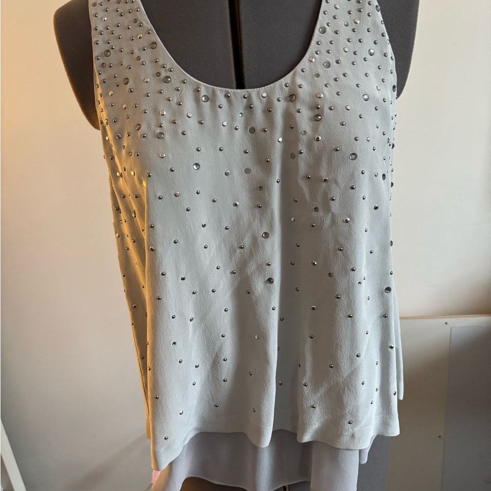 Elegant White Sleeveless Top with Embellishments